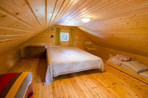 A bed or beds in a room at Ahvenlampi Camping