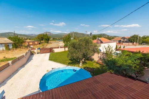 a view from the roof of a house with a swimming pool at Villa Vadian & Pool in Gevgelija