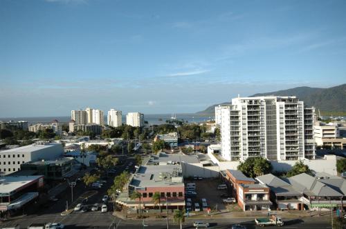 an aerial view of a city with tall buildings at Cairns Central Plaza Apartment Hotel Official in Cairns