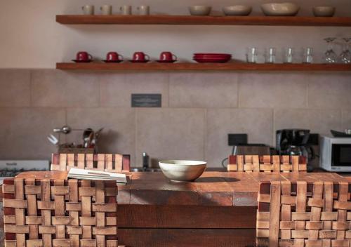 a kitchen with a counter with a bowl on it at Hotel Alto Traful in Villa Traful