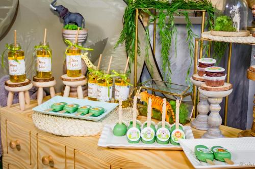a table topped with sushi and food on top at Plaza La - Night and Spa in Sremska Mitrovica