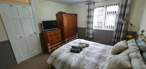 Gulta vai gultas numurā naktsmītnē Double room near Telford Town centre