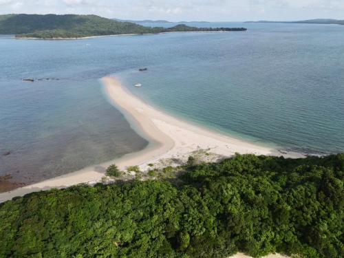an aerial view of a beach in the ocean at Coto Center Homestay in Dao Co To