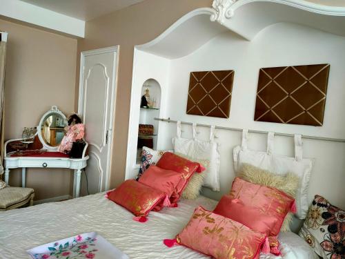 Tempat tidur dalam kamar di La Lilloise Villeneuve D'Ascq GD STADE Mauroy