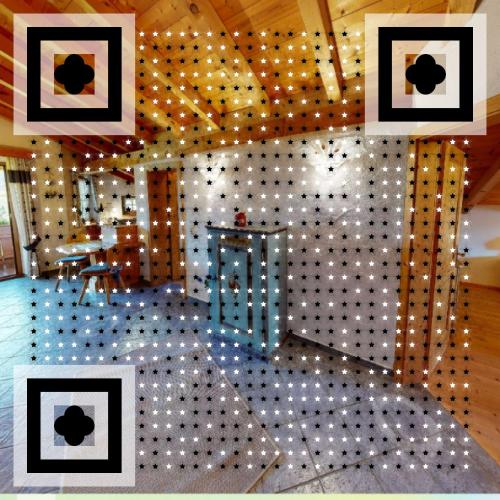 a room with a wall with white polka dots at Schlosserhof in Telfes im Stubai