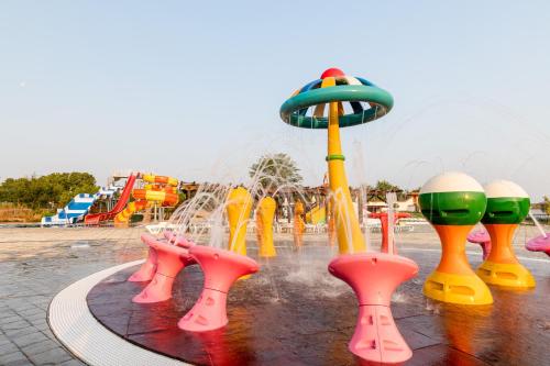 a park with a water park with a roller coaster at Villa Trakia in Simeonovo
