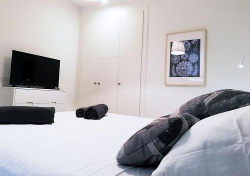 En eller flere senge i et værelse på Panorama Beach - Apartamento Brisa del Mar