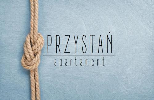 赫爾的住宿－Przystań Hel Apartament，一条绳子,用帕斯威基亚语独立