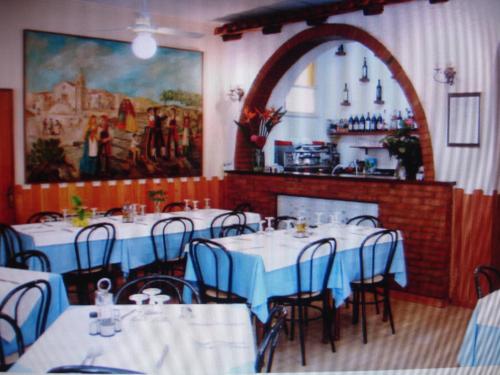 En restaurant eller et andet spisested på Hotel La Rusticana