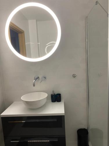 Ένα μπάνιο στο Apartament Amber