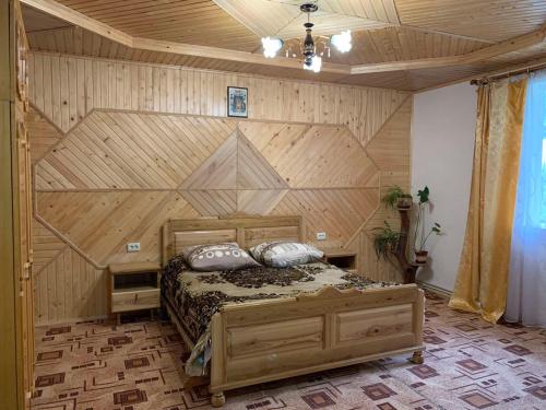 Кровать или кровати в номере Приватна садиба Яблуневий сад