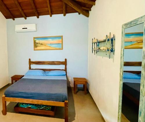Katil atau katil-katil dalam bilik di Lindo Apartamento, Condominio VilaZion, Arraial d' Ajuda centro