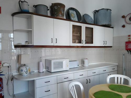 A kitchen or kitchenette at Guest House VC17