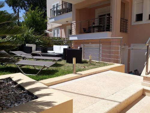a view of the backyard of a house at Apartment Lilly, apartment with communal pool, 10 meters from sea in Sami