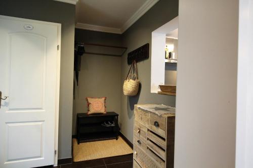 a hallway with a dresser and a drawer in a room at Apartment Franz-Walde-Weg by Apartment Managers in Kitzbühel
