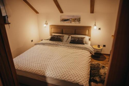Ліжко або ліжка в номері Villa Magnolia