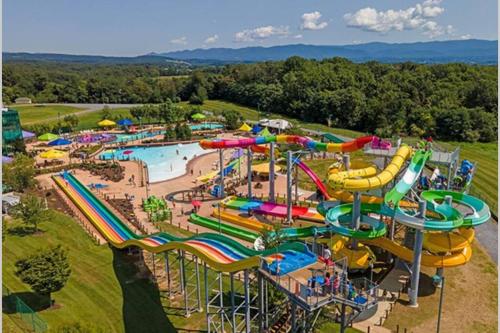 an aerial view of a water park at Massanutten retreat- hiking, river, waterpark, resort in McGaheysville