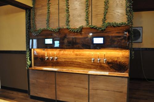 a counter in a room with a wooden wall at K7 Bed and Breakfast in Pahrump