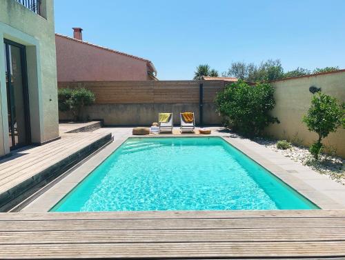 Photo de la galerie de l'établissement Le Petit Bali Spacieuse Villa pour 8 avec Piscine, à Saint Cyprien Plage