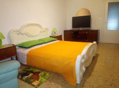 Ένα ή περισσότερα κρεβάτια σε δωμάτιο στο B&B 76 EURO a NOTTE