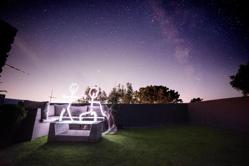 a garden at night with a starry sky at Timber Hill - Parkfields in Haverfordwest