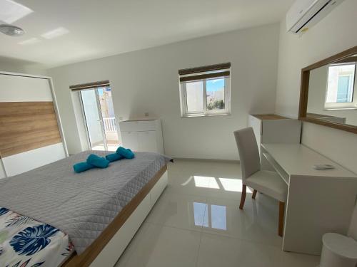 Imagen de la galería de Sunshine Apartments Mellieha - modern two bedroom penthouse with terrace, en Mellieħa