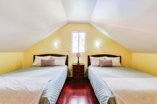 Posteľ alebo postele v izbe v ubytovaní Casa da Pedra