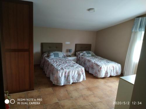 Posteľ alebo postele v izbe v ubytovaní villa cienfuegos