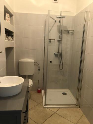 Ванная комната в Apartman Tapolca Belváros