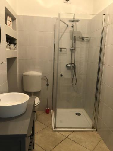 Kúpeľňa v ubytovaní Apartman Tapolca Belváros