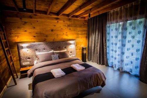 Giường trong phòng chung tại Woodstock Villa