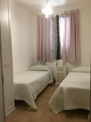 A bed or beds in a room at Birgi holiday home
