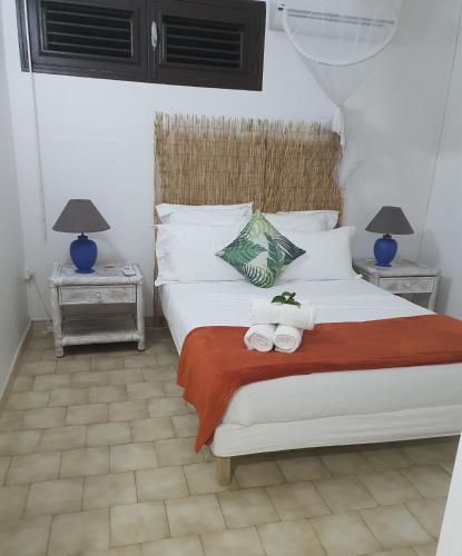 Cama o camas de una habitación en ROY'AL BEACH HOLIDAYS