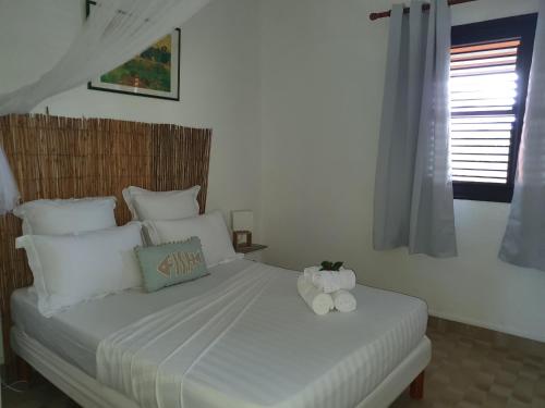 Postel nebo postele na pokoji v ubytování ROY'AL BEACH HOLIDAYS