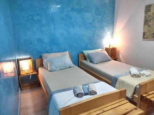 Posteľ alebo postele v izbe v ubytovaní Stone Villa Hvar Ana Nikola Beach Park and Sea View