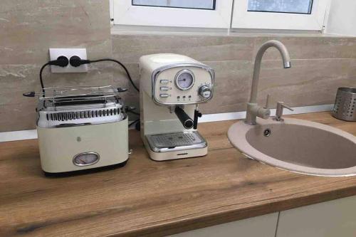 Køkken eller tekøkken på Magheru cozy new apartament 2 rooms