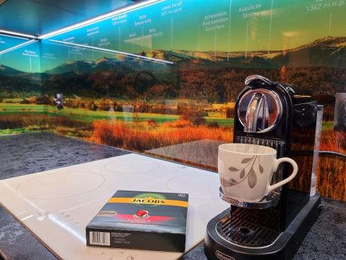 Kemudahan buat kopi dan teh di Apartament Jelonek