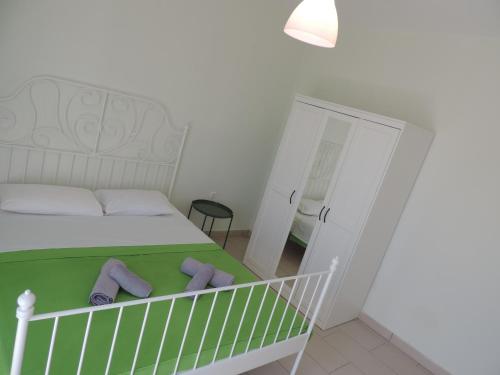 Кровать или кровати в номере Fotis Apartments