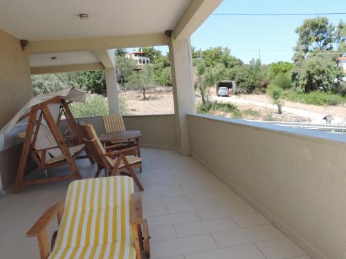 Балкон или терраса в Fotis Apartments