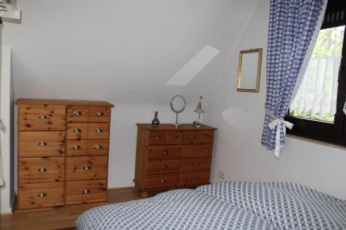 Ένα ή περισσότερα κρεβάτια σε δωμάτιο στο Eine Quelle der Ruhe und Erholung