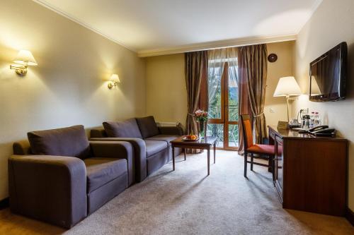 Televisyen dan/atau pusat hiburan di Romantik Spa Hotel