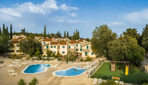 an aerial view of a resort with a swimming pool at Aminess Vival Port9 Residence in Korčula