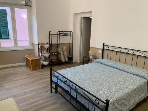 Postel nebo postele na pokoji v ubytování DOMUS L’AUREA