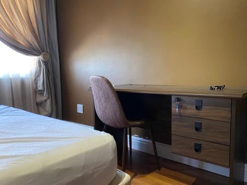 Letto o letti in una camera di Rondebosch Luxury Living