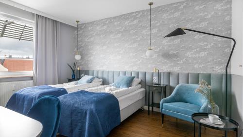 Posteľ alebo postele v izbe v ubytovaní Comfy Apartments - Lastadia LUX