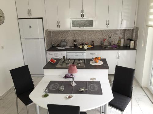Кухня или мини-кухня в BELKA GOLF RESİDENCE Dublex BELEK
