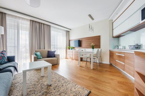 Een zitgedeelte bij Apartamenty Sun & Snow Marina Kąty Rybackie