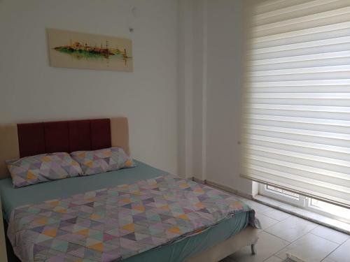 Кровать или кровати в номере BELKA GOLF RESİDENCE Dublex BELEK
