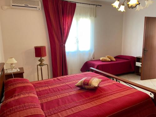 Llit o llits en una habitació de Appartamento - Le Saline