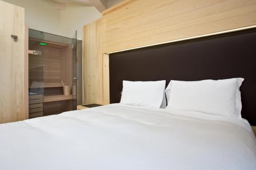 Hotel Delle Alpiにあるベッド